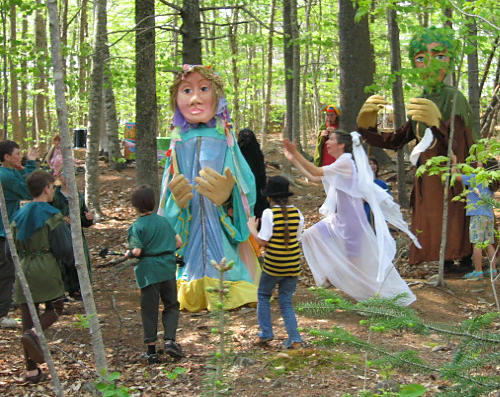 dancers and giant puppets